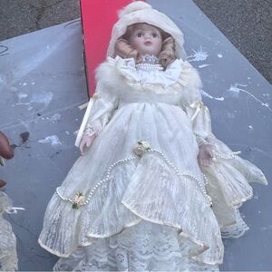 Elegant Cream Porcelain Doll